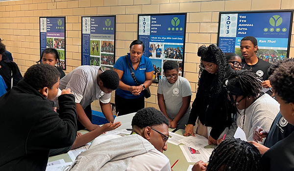 a Fulton employee mentoring students